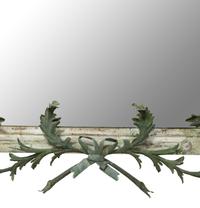 A Green Tole Peinte Foliate Mounted Mirror