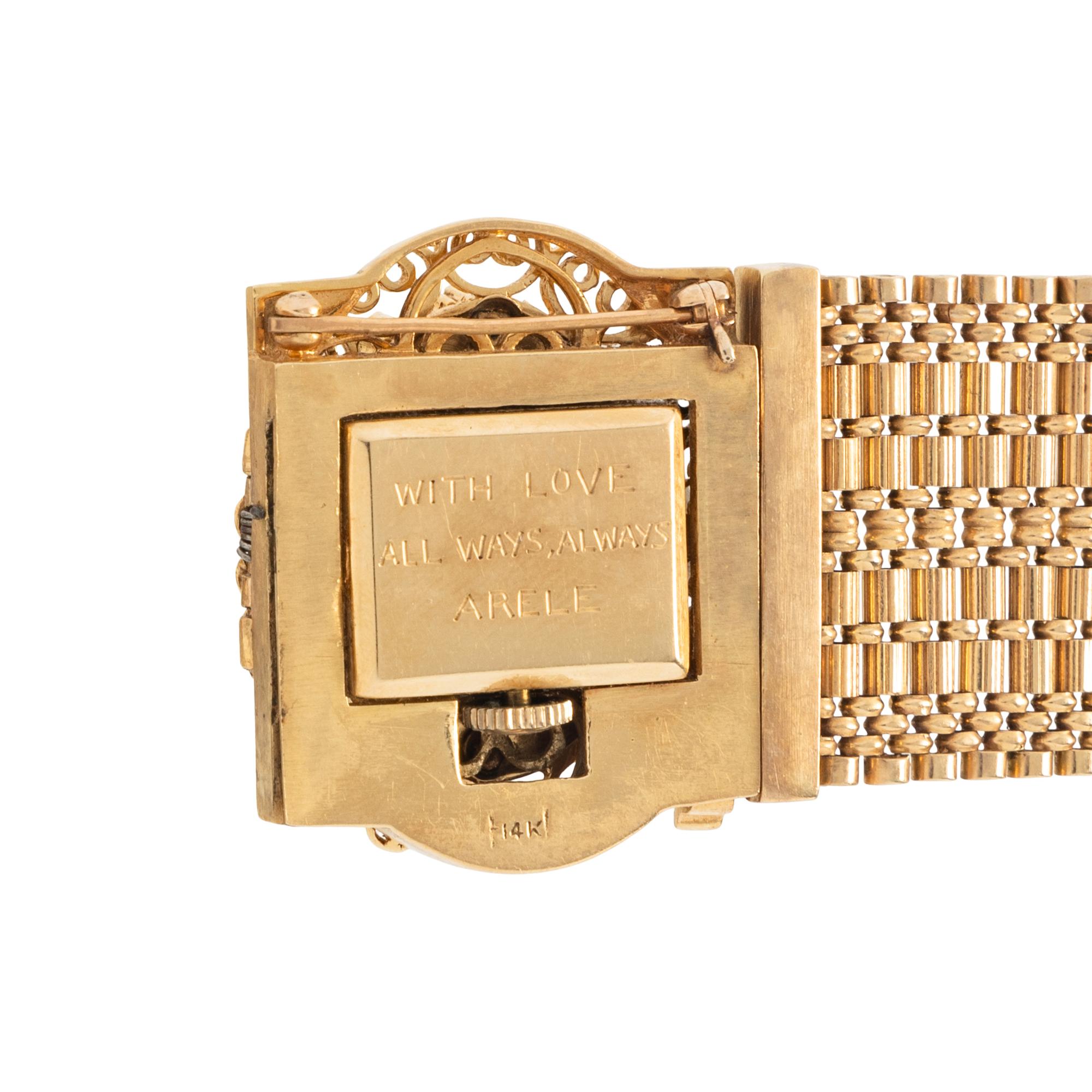 YELLOW GOLD, SEED PEARL, AND ENAMEL CONVERTIBLE SURPRISE WATCH