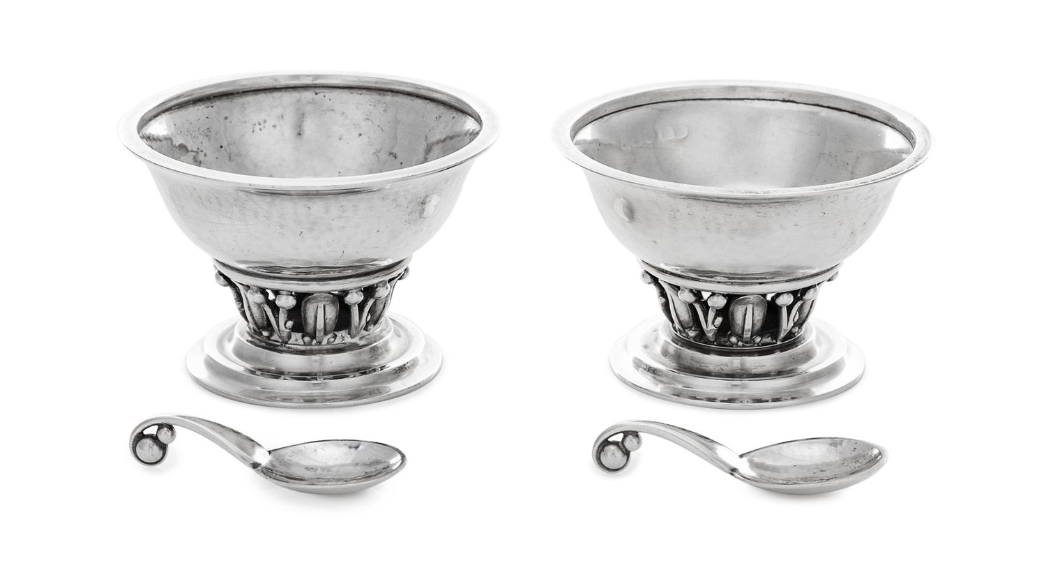A Pair of Danish Silver Salts, Georg Jensen Silversmithy, Copenhagen, Circa 1940, model 180 with conforming salt spoons.