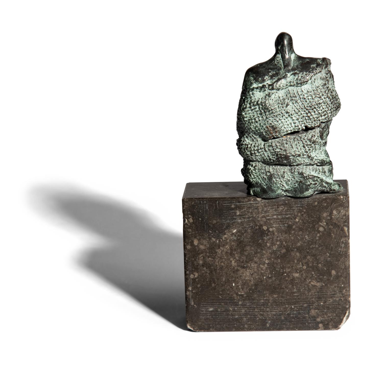 Sculpture, seated man
