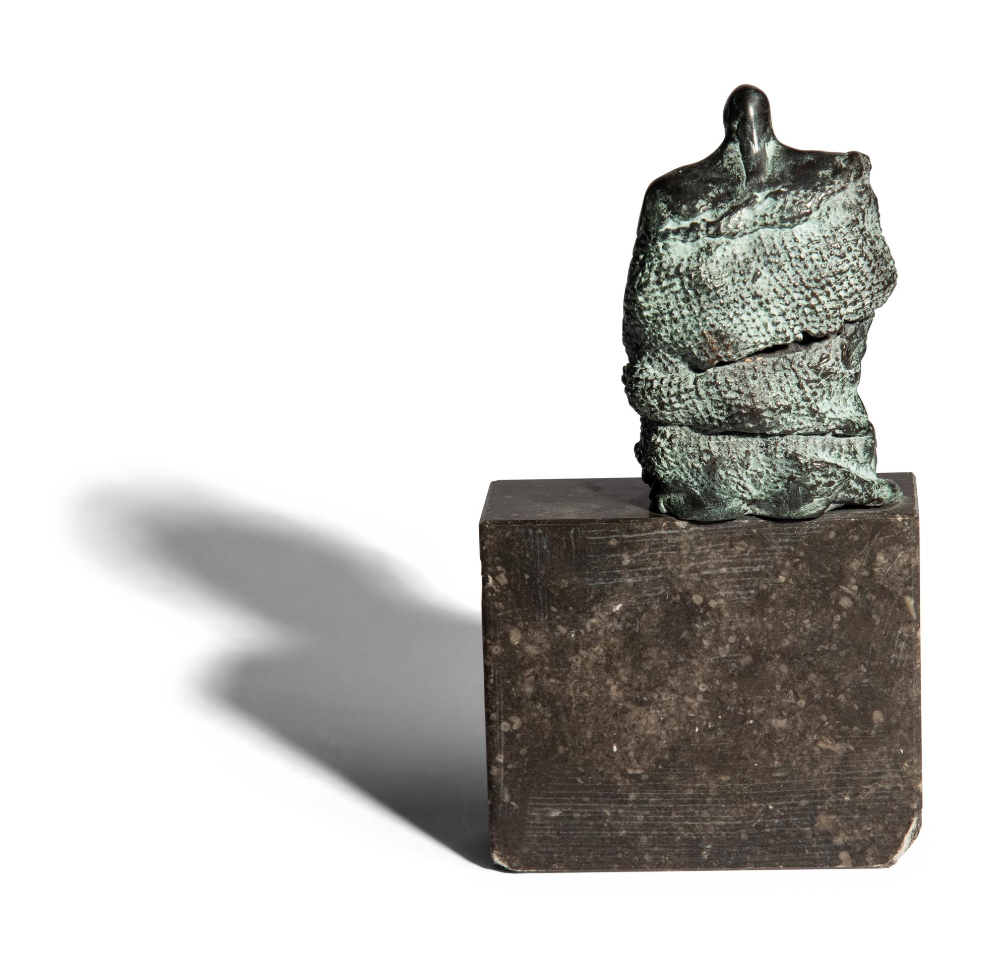Sculpture, seated man