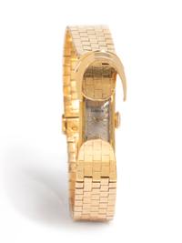 GÜBELIN, 18K YELLOW GOLD SURPRISE WATCH
