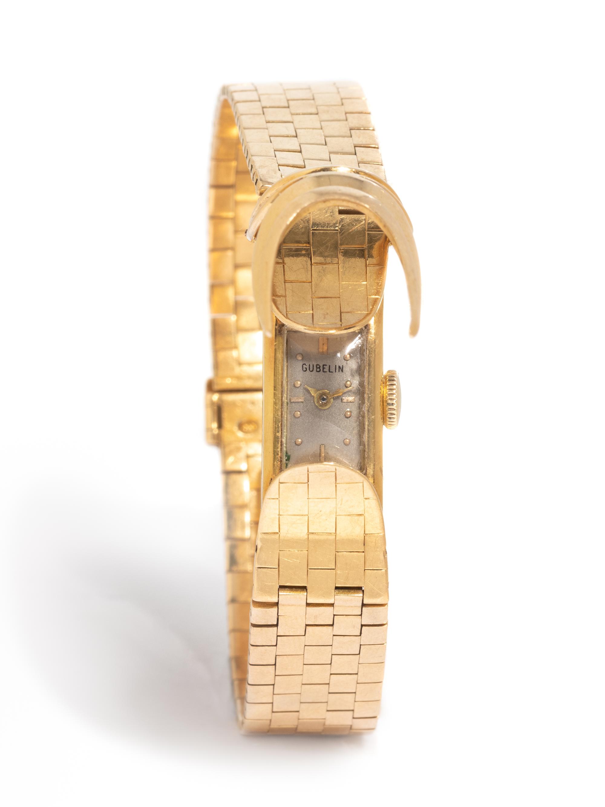 GÜBELIN, 18K YELLOW GOLD SURPRISE WATCH