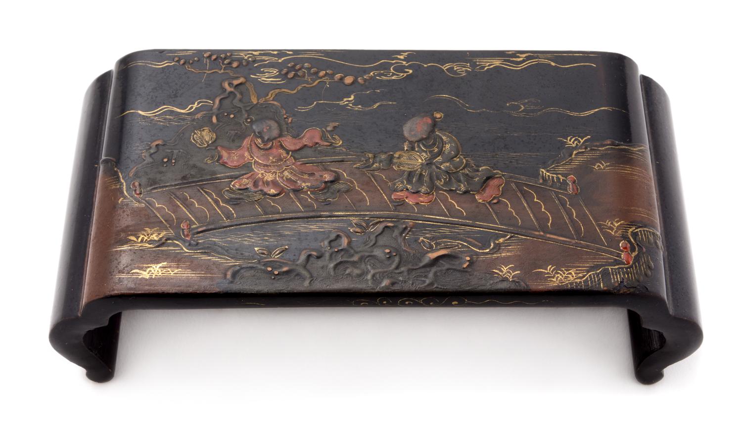 A Black Lacquer Stand Length 7 inches.