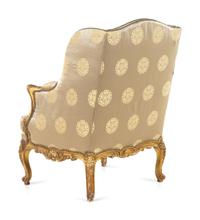 A Louis XV Style Carved Giltwood Bergère à Oreilles