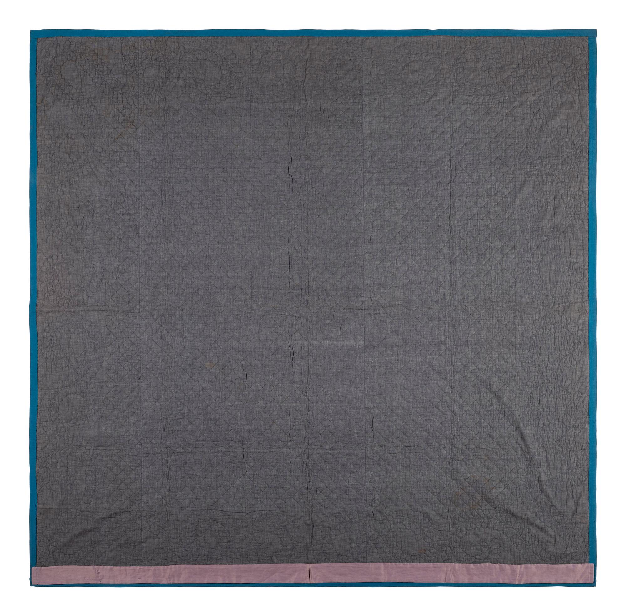 An Amish Sunshine and Shadow Pieced Cotton Quilt