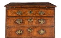 A George II Walnut Chest of Drawers
