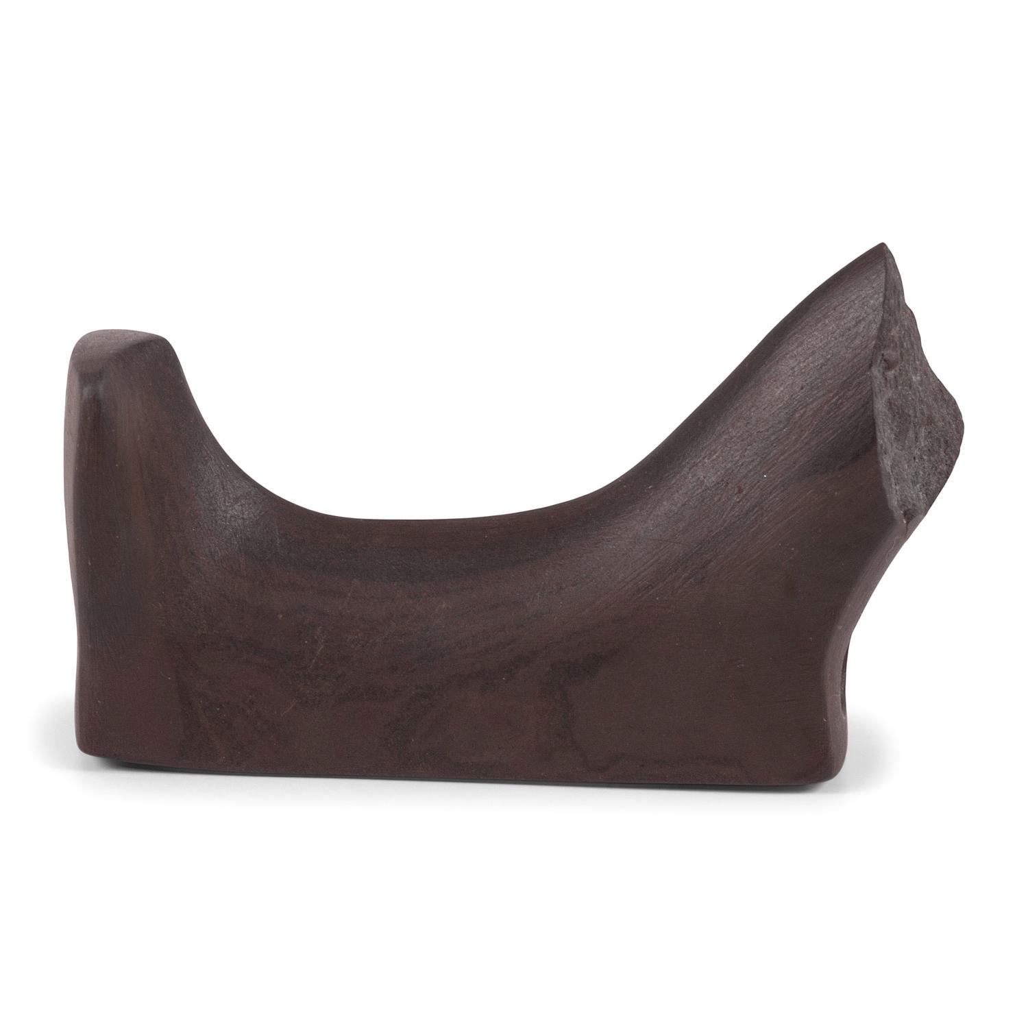 A Banded Red Slate Headless Birdstone