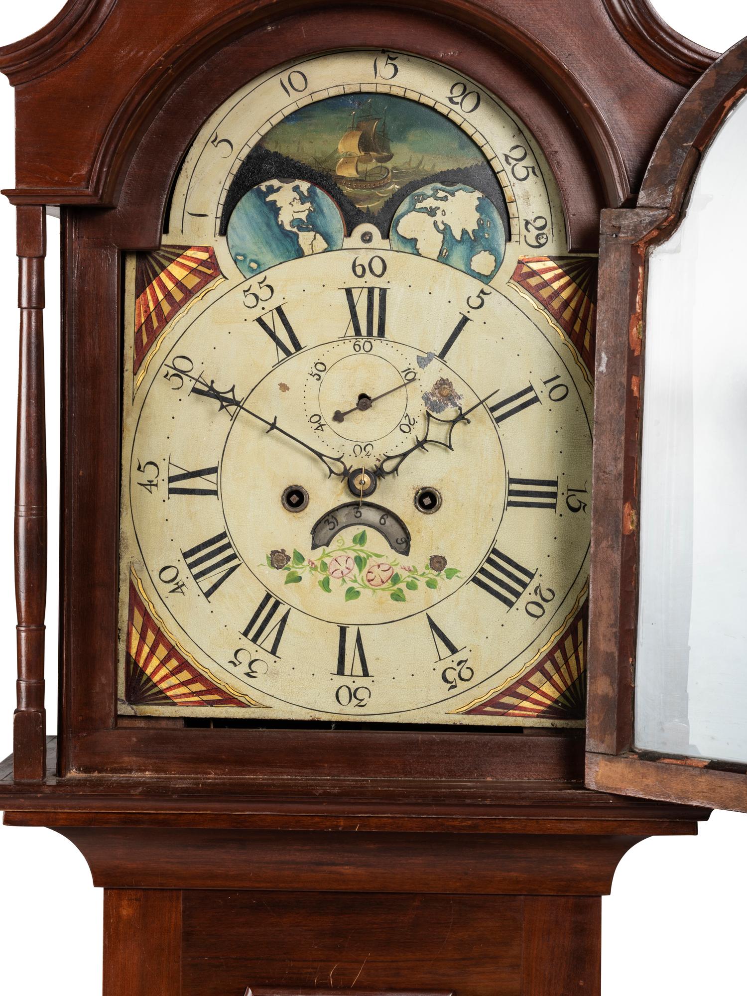 A Federal Carved Cherrywood Tall Case Clock