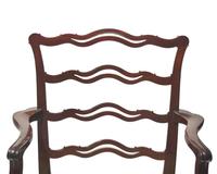 A pair of George III ribbon-back mahogany armchairs, late 18th / 19th century