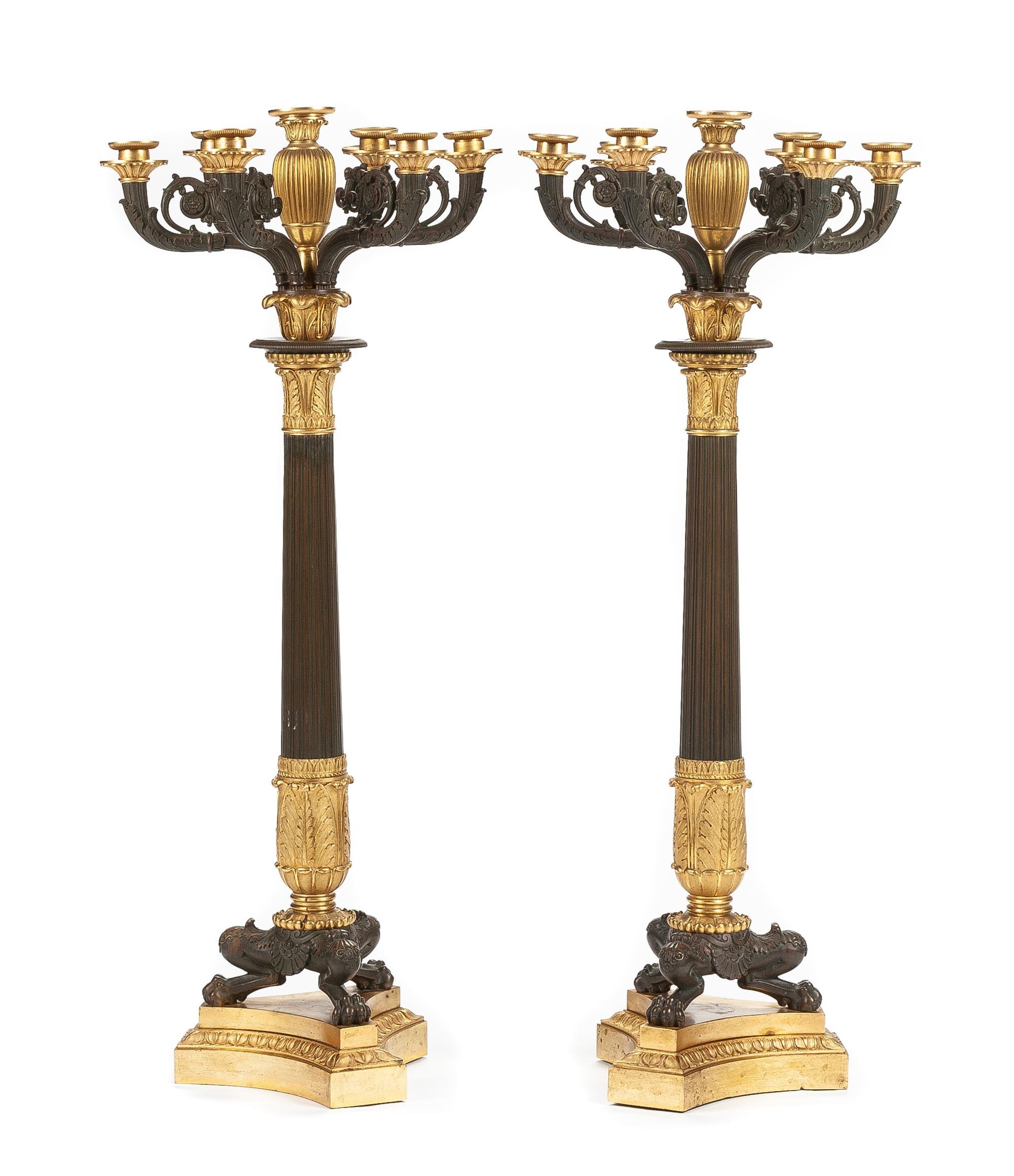 A Pair of French Gilt and Patinated Bronze Seven-Light Candelabra Height 31 1/2 inches. — 19TH CENTURY
