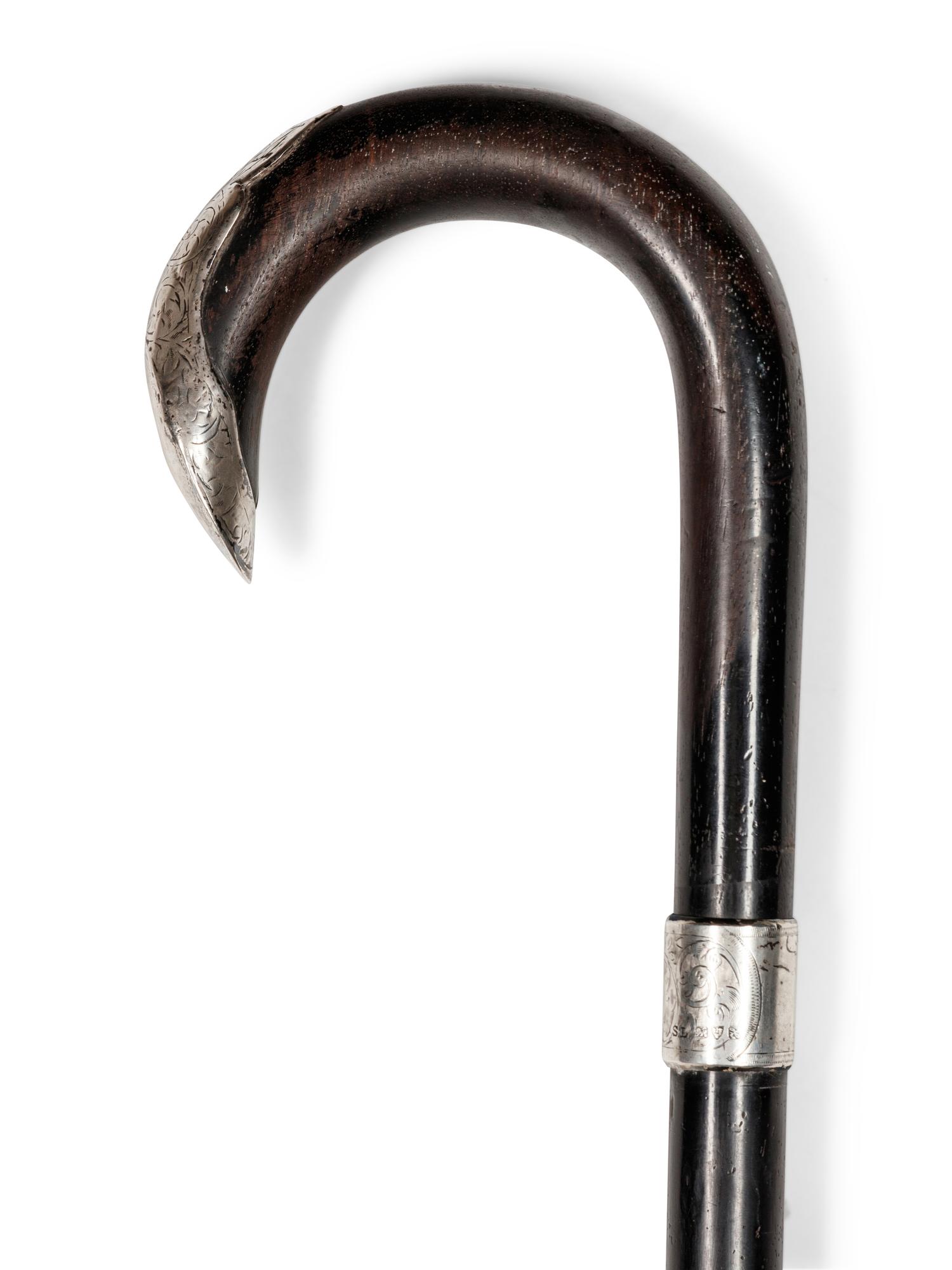 An English Silver Mounted Ebony Walking Stick