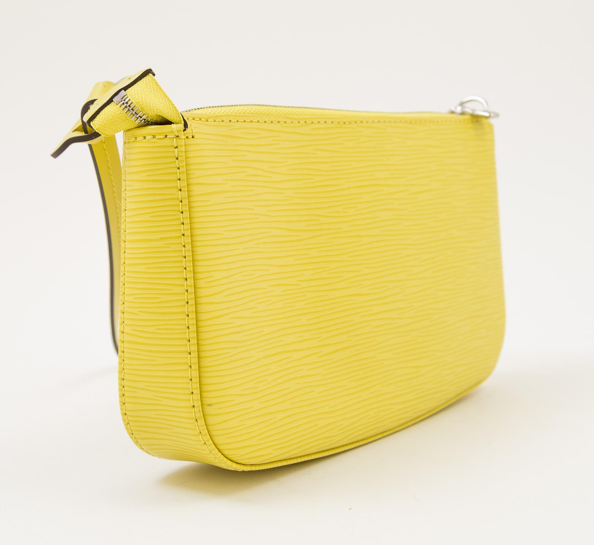 A Louis Vuitton Neon Yellow Epi Leather Pochette, 9" x 5.25" x 1.25"; Strap drop: 9".