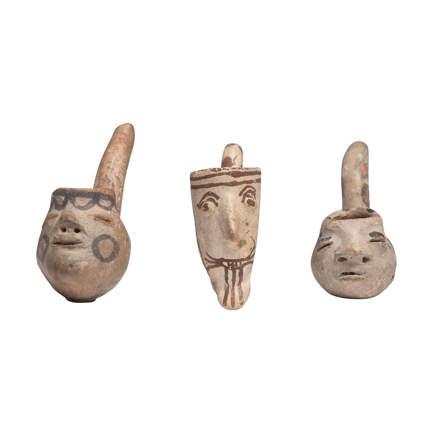 Tesuque Rain God and Puebloan Pottery Pipes