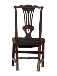 A Chippendale Carved and Black-Painted Walnut Side Chair