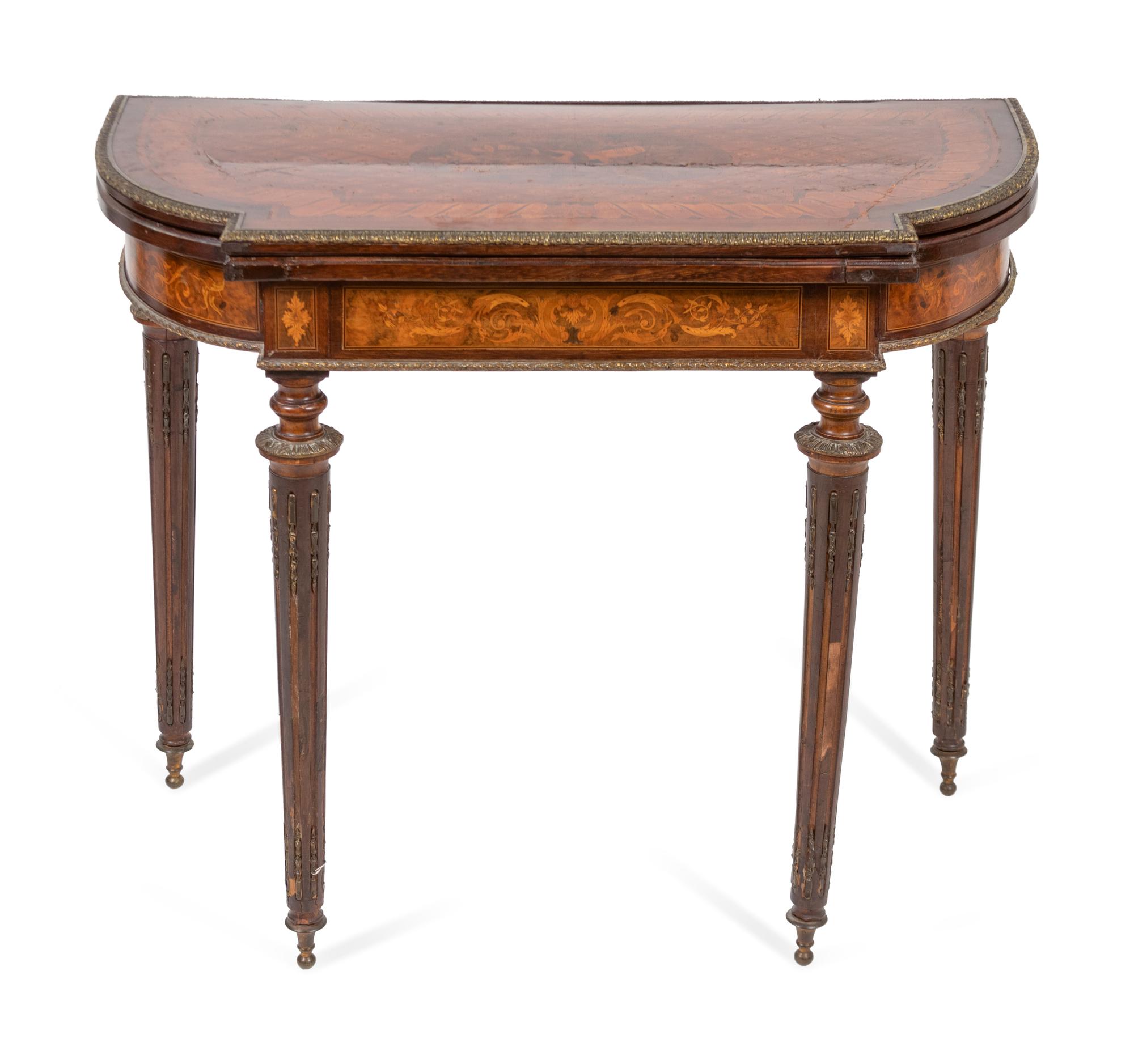 A Louis XVI Style Bronze-Mounted Marquetry Games Table
