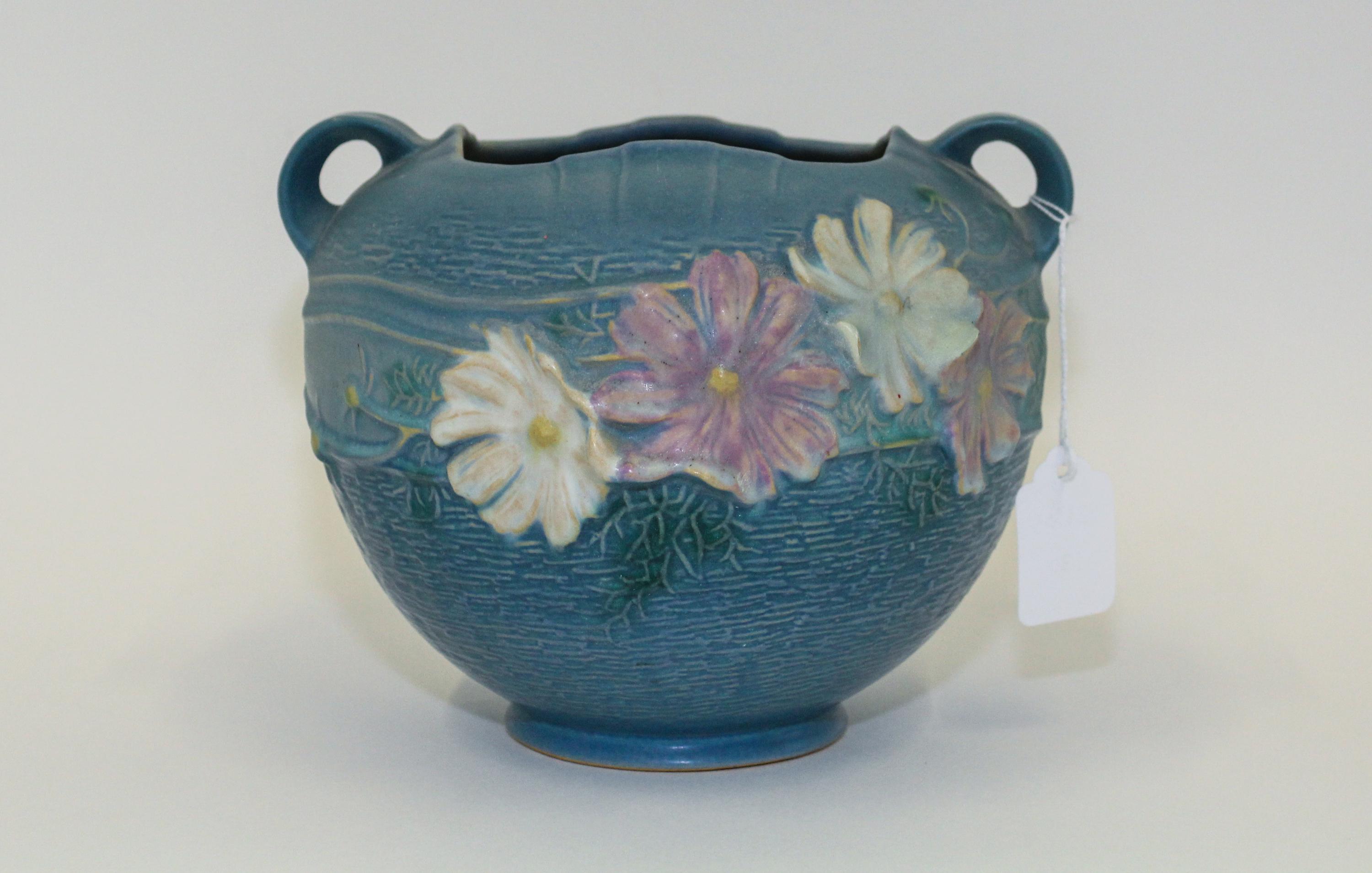 A Roseville Pottery Vase Height 6 1/4 inches.