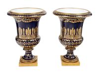 A Pair of Sèvres Ormolu-Mounted Porcelain Campagna Vases