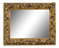 A Continental Carved Giltwood Mirror