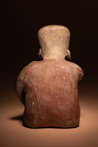 A Colima Terracotta Kneeling Figure