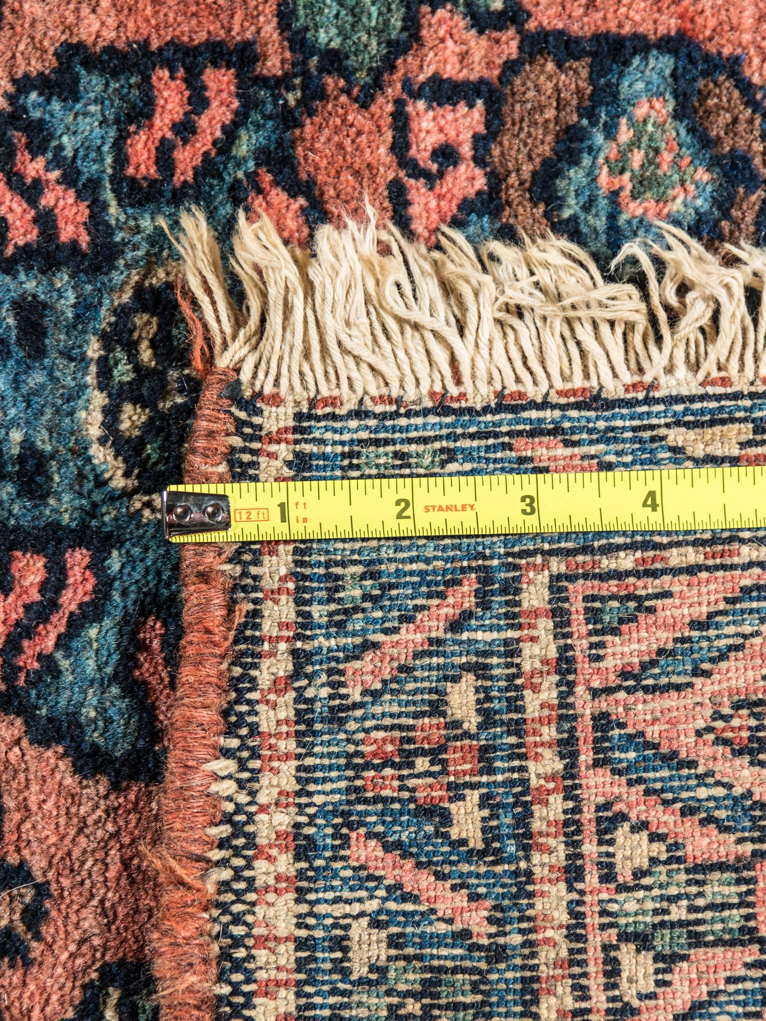 Five Wool Rugs
