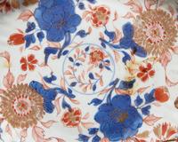 A Chinese Imari porcelain dish mounted in giltwood frame, circa 1700 and later