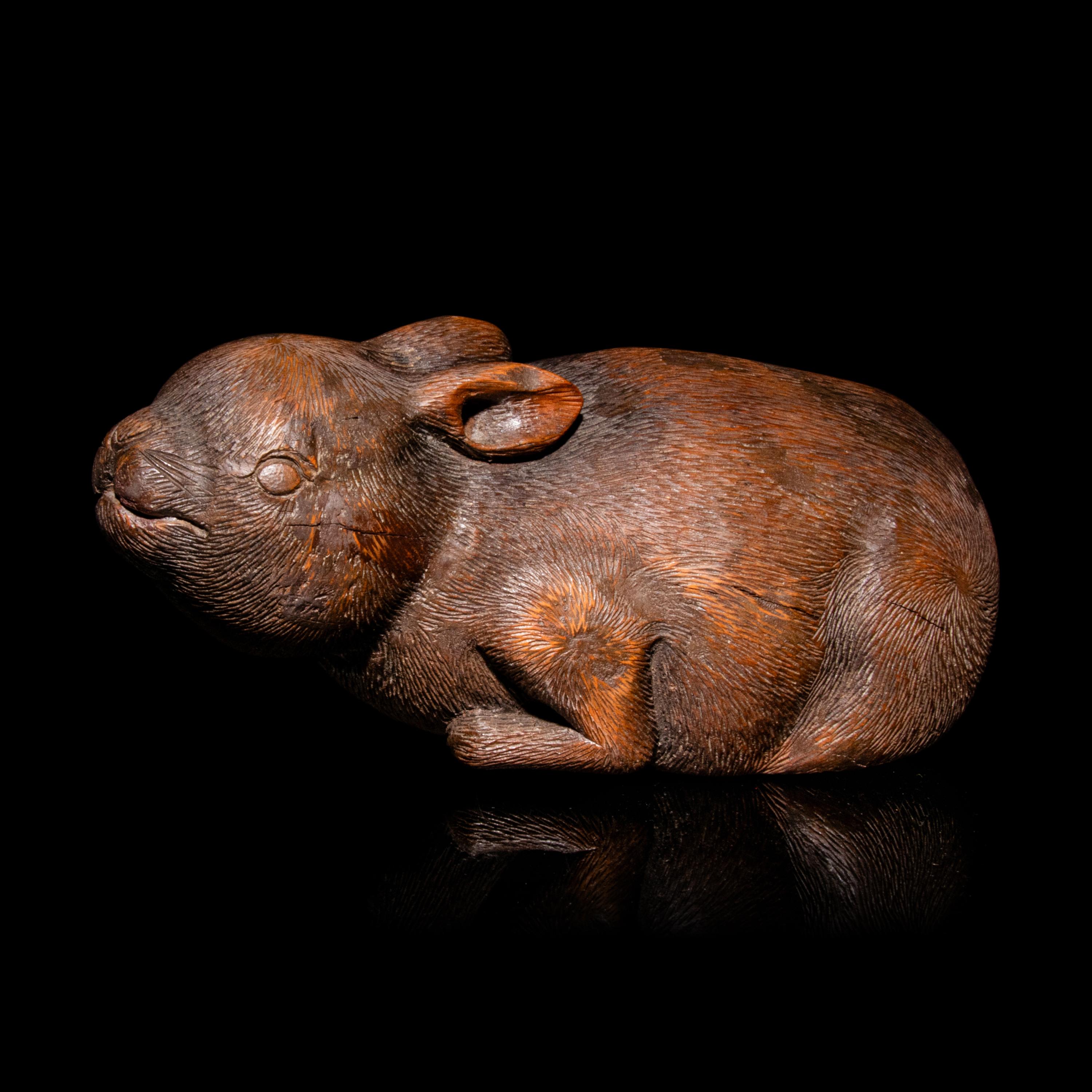 A Charming Chinese Bamboo Root Carving of a Rabbit, 19th Century 清晚期 竹根雕臥兔