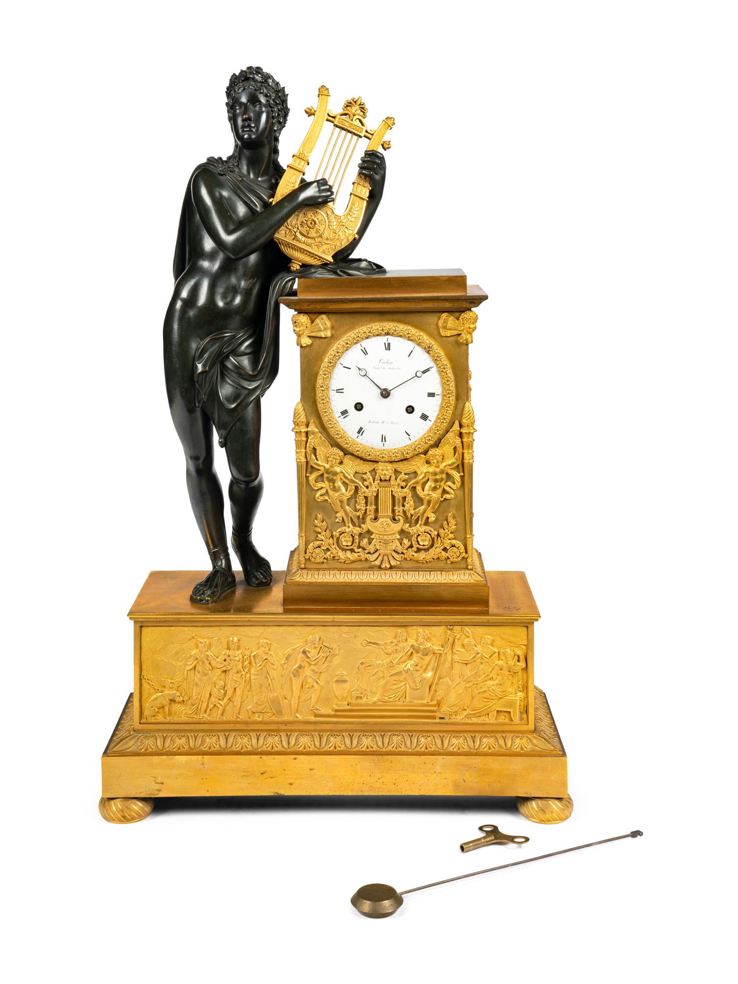 A Restauration Gilt and Patinated Bronze Mantel Clock with Orpheus and a Lyre