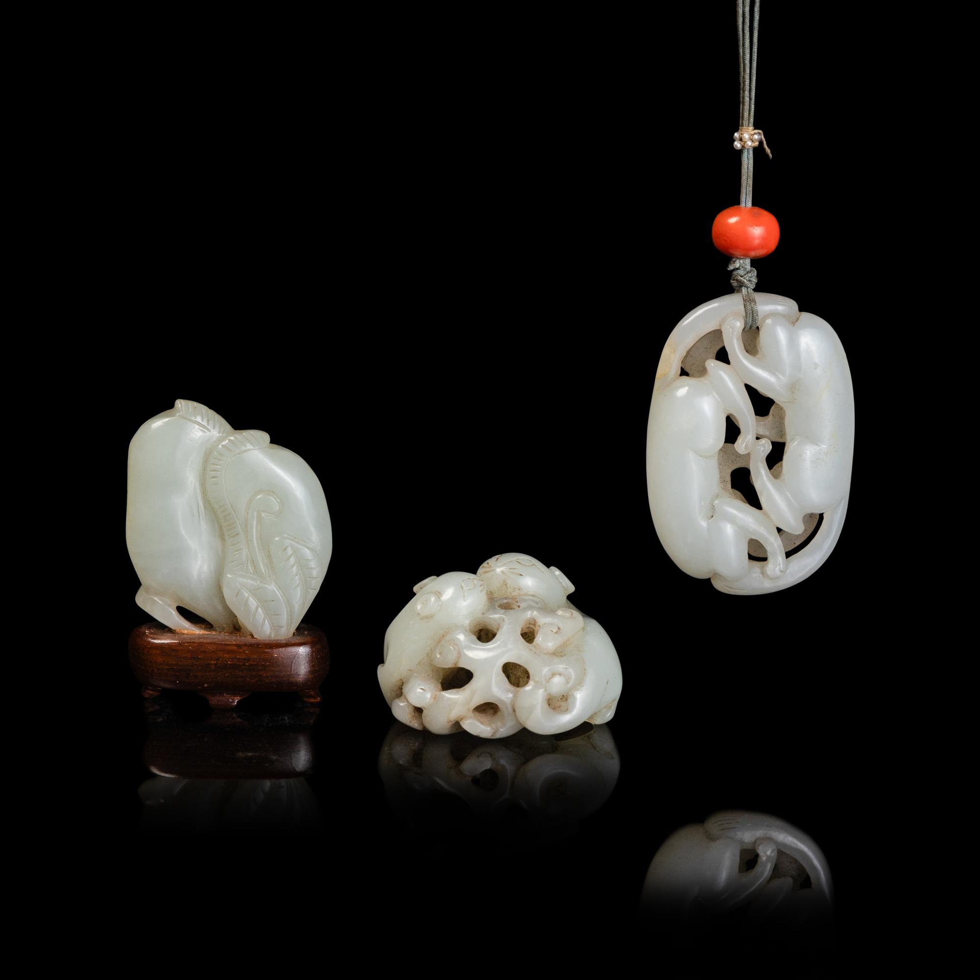 Three Chinese White and Pale Celadon Jade Pendants, 19th-Early 20th Century 晚清-民國 白玉及青白玉把件三枚