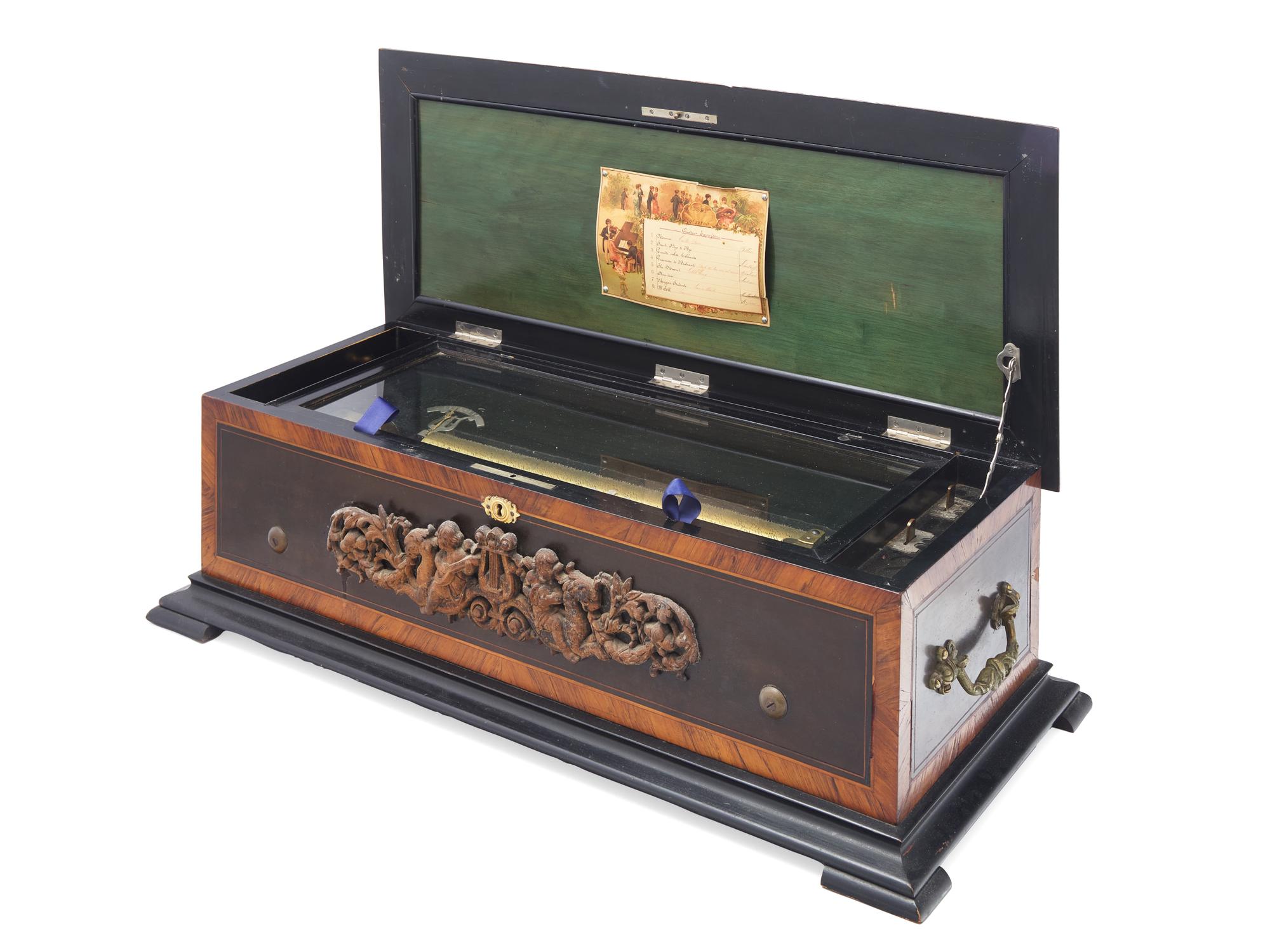 A Swiss Ebonized and Rosewood-Veneered Cylindrical Music Box