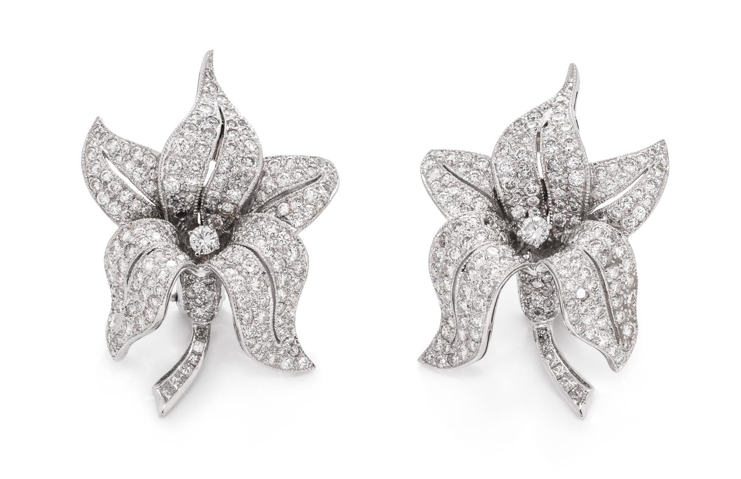 A Pair of 18 Karat White Gold and Diamond Flower Earclips, French,