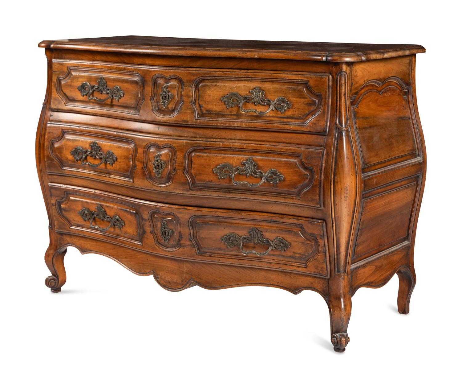 A Louis XV Style Walnut Bombe Commode
