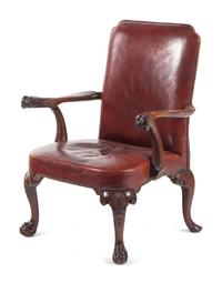 A George II Leather-Upholstered Carved Mahogany Library Chair
