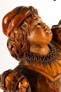 An Austrian Carved Wood Figural Torchere
