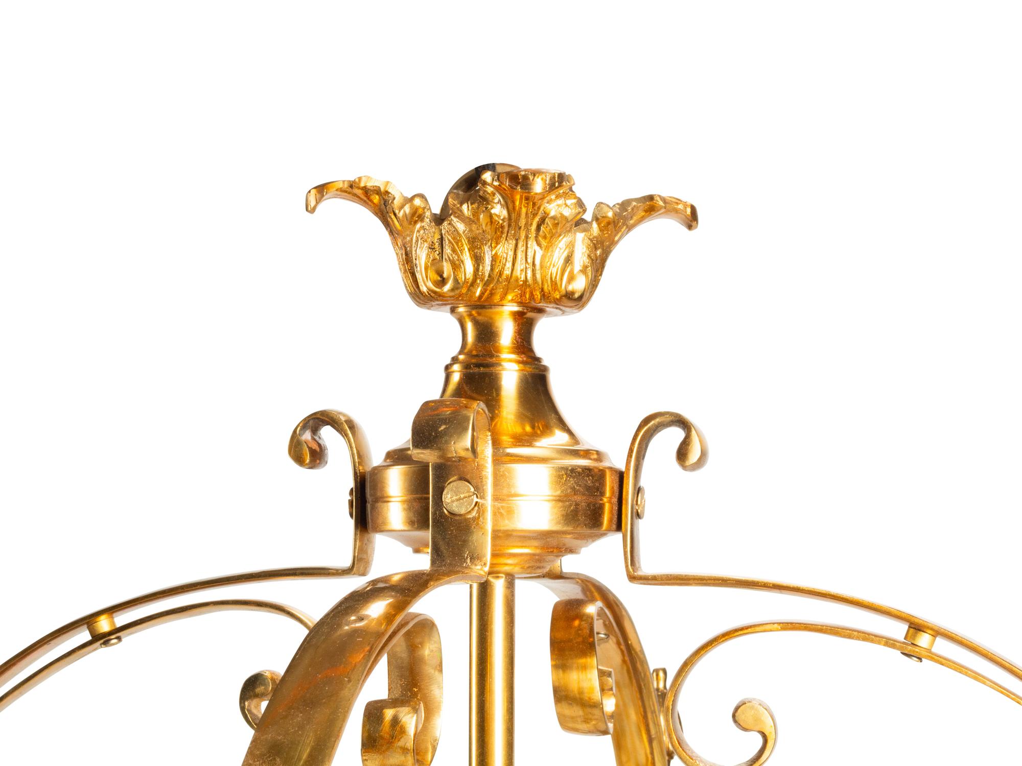 A Pair of Louis XVI Style Gilt Bronze and Etched Glass Hall Lanterns