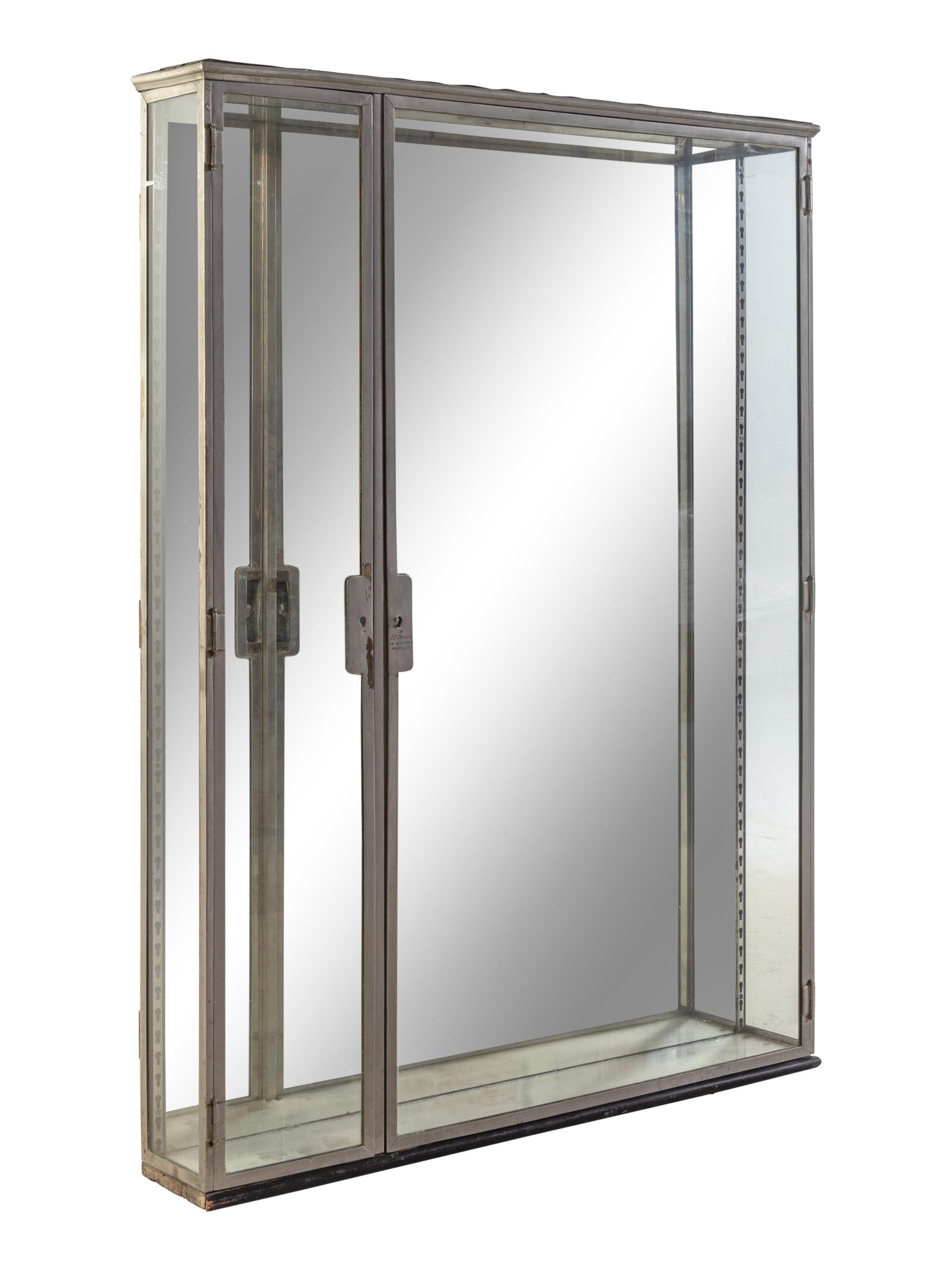 A Belgian Steel and Glass Pharmacy Case with Adjustable Glass Shelves