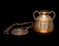 An African Metalwork Pendant and Copper Jar