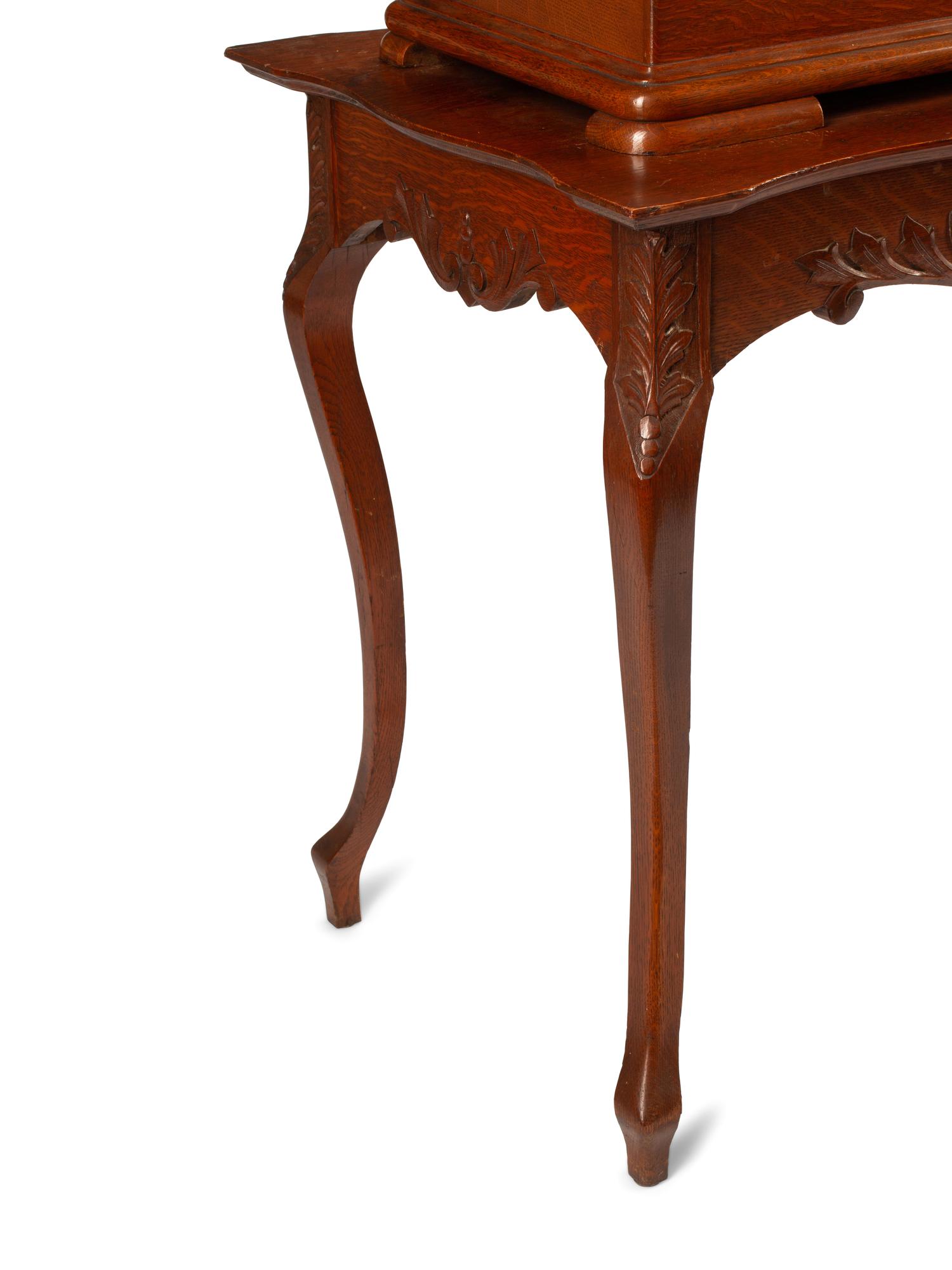A Swiss Oak-Cased Cylinder Music Box and an Associated Stand