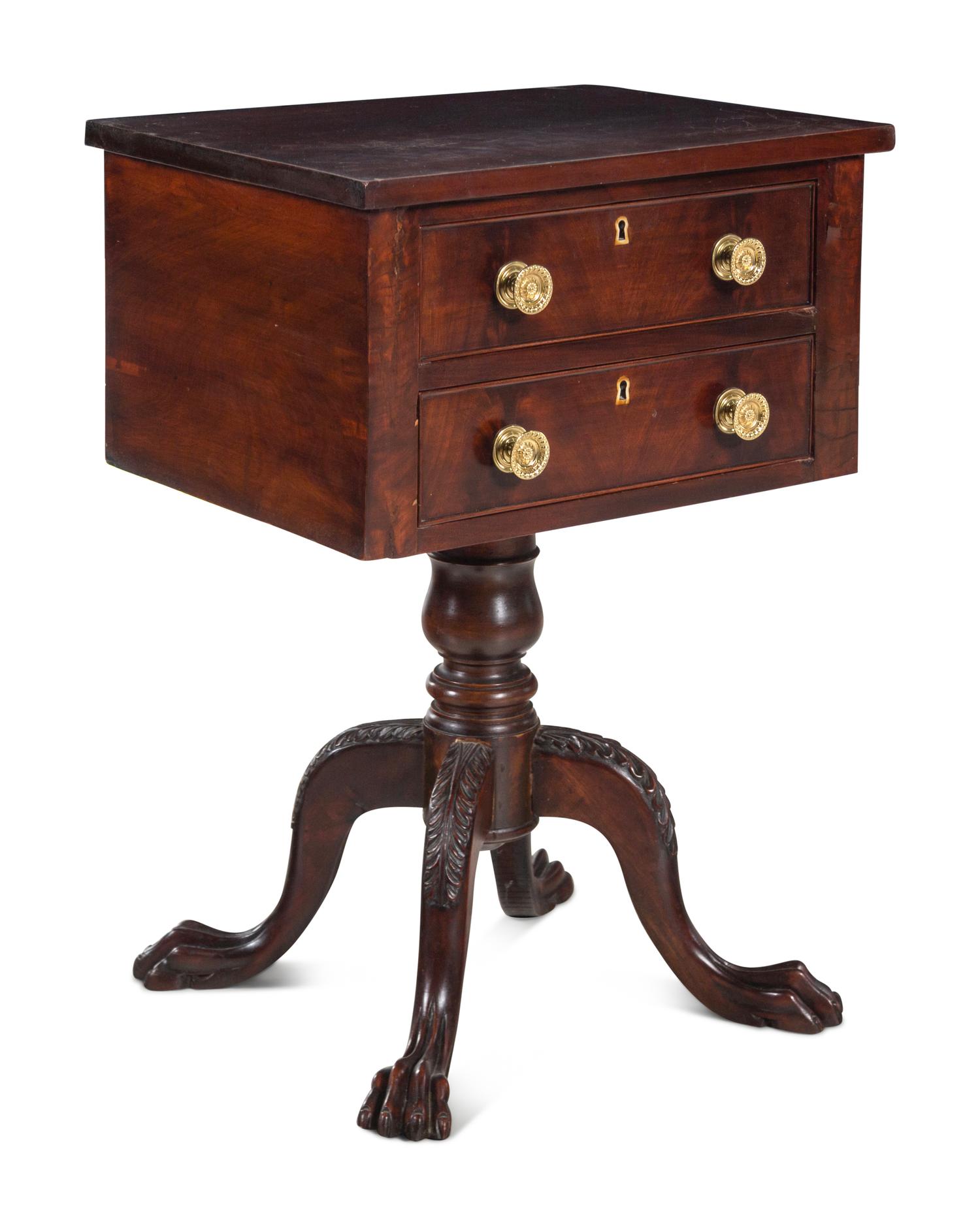 A Late Classical Carved and Figured Mahogany Work Table