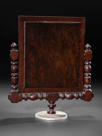 A Folk Art Carved and Inlaid Countertop Mirror