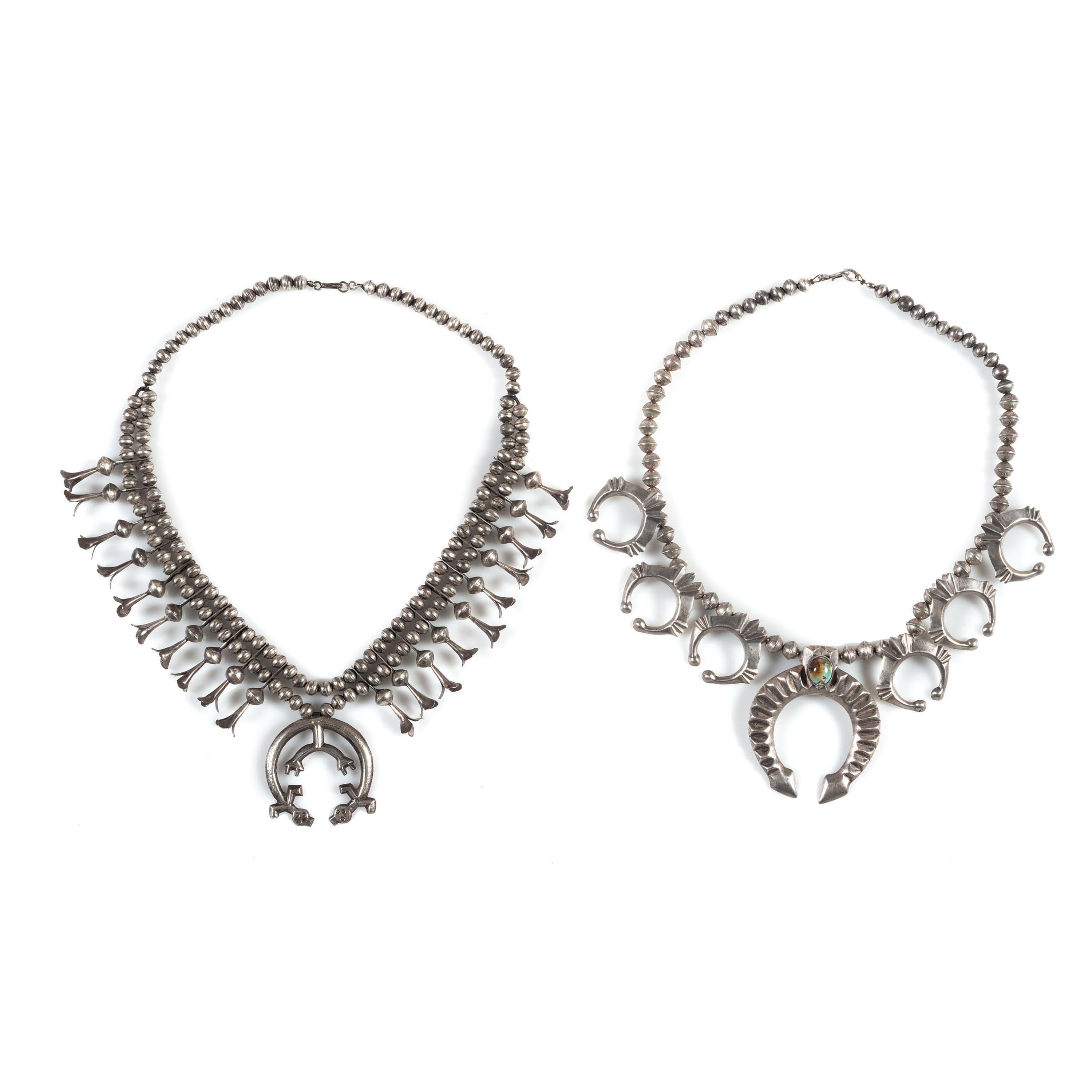 Pair of Navajo Sandcast Silver Squash Blossom Necklaces