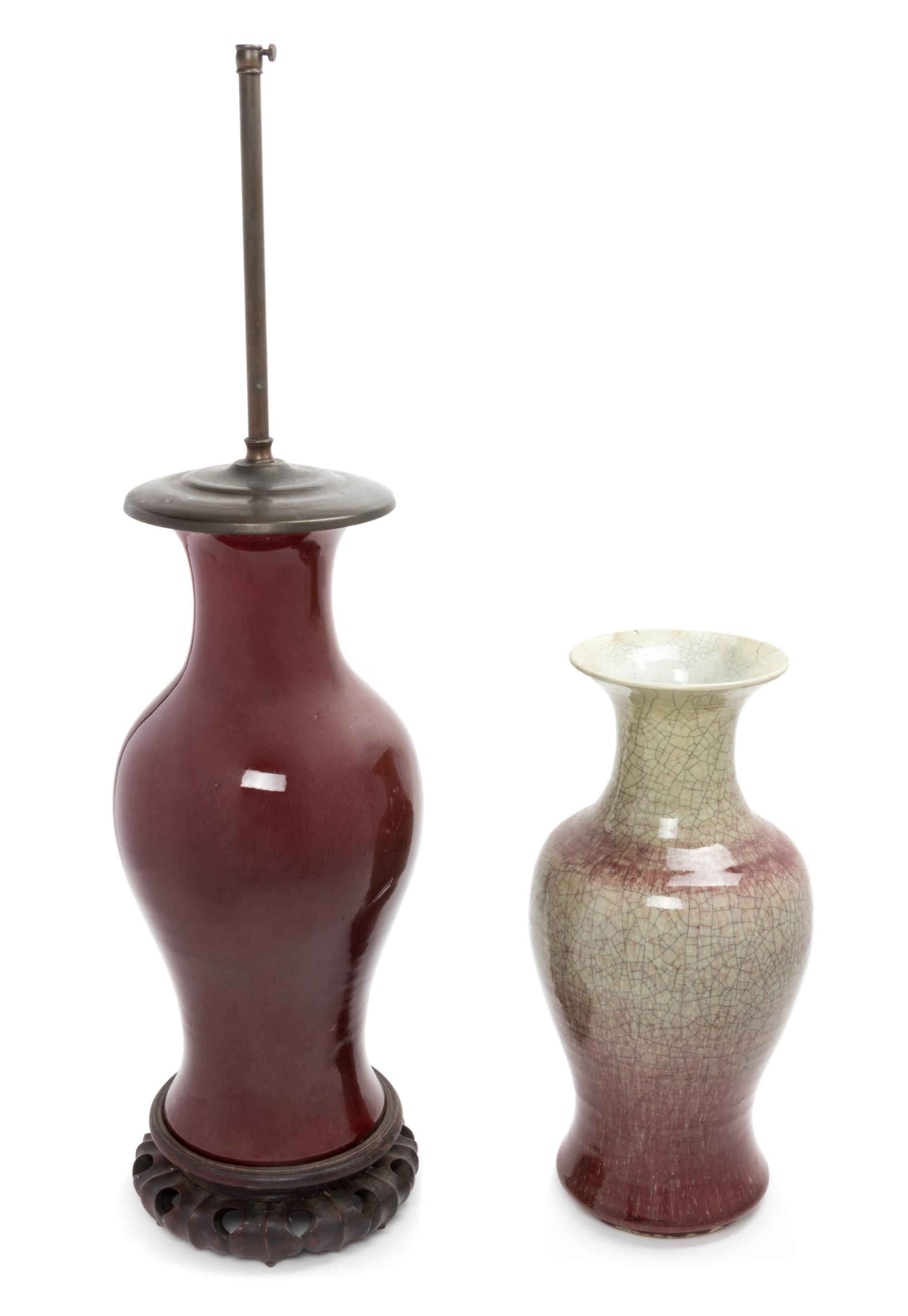 Four Chinese Red Glazed Porcelain Vases Height of largest 16 1/8 inches.