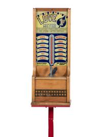 An Exhibit Supply Co. 1 Cent Love Meter on Stand