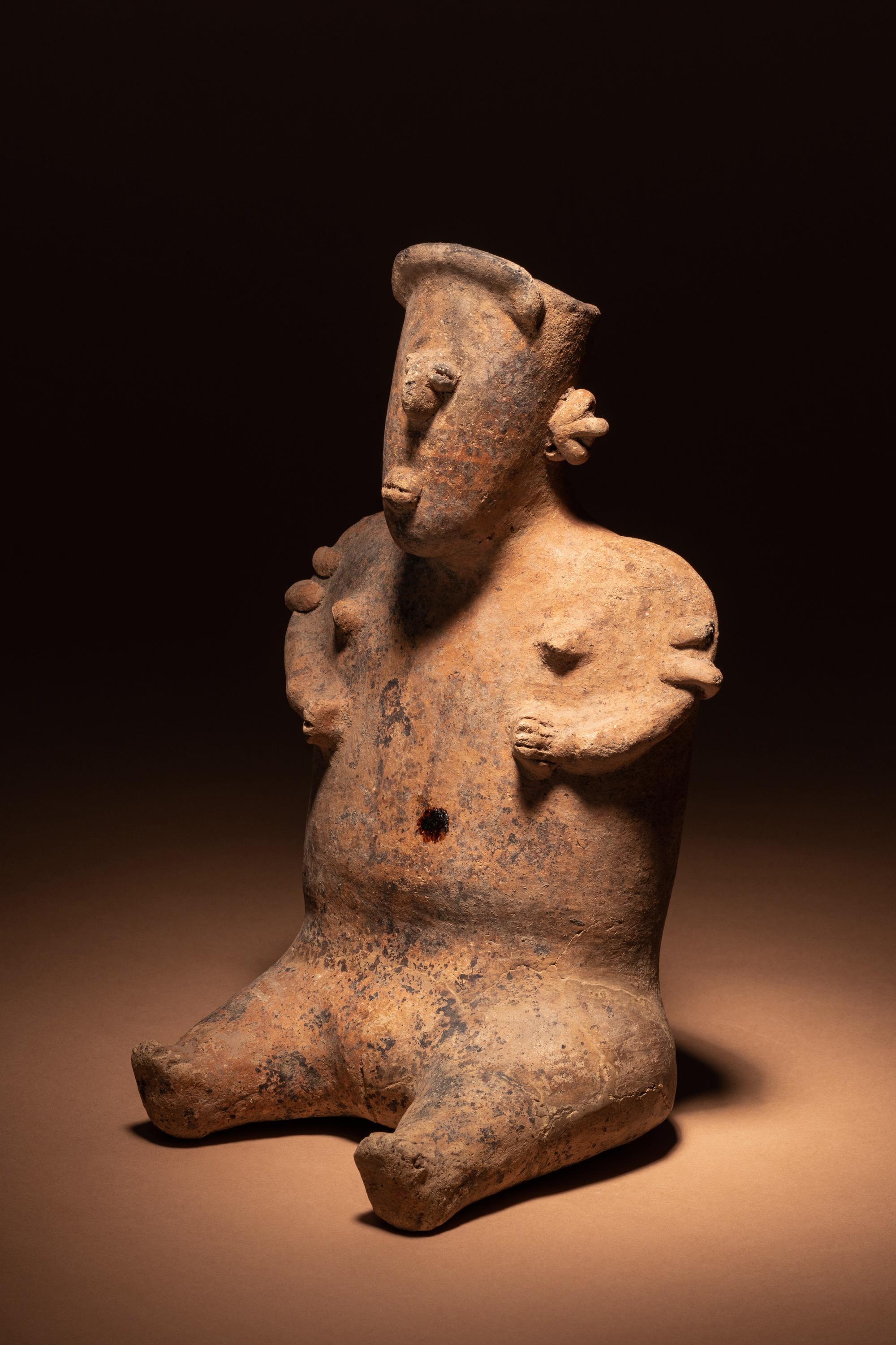 A Nayarit Terracotta Seated Female Figure