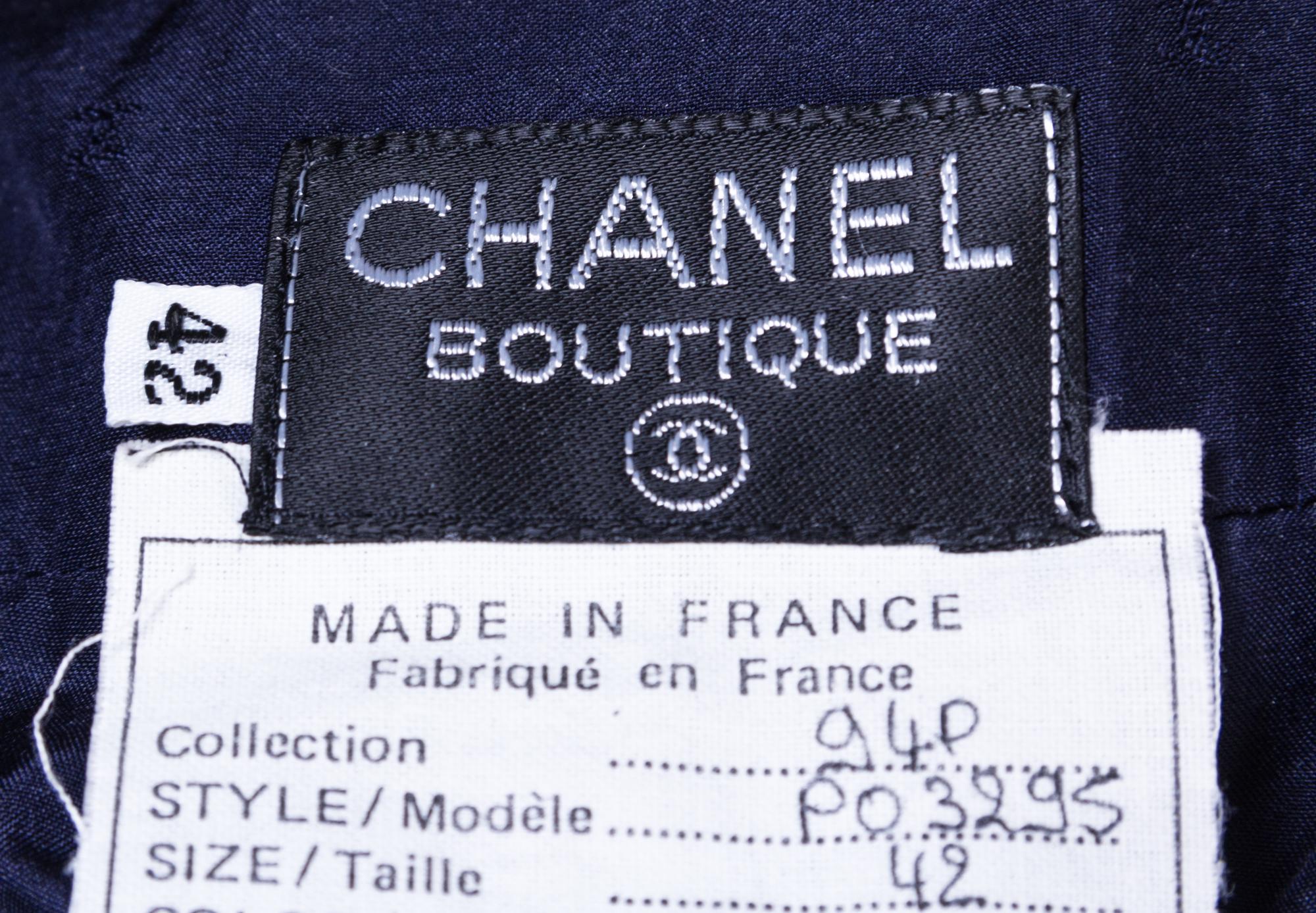 A Chanel Navy Suit, Size 42.