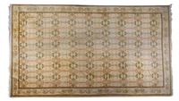 An Oushak Wool Rug, 18 feet 4 inches x 10 feet 4 inches.