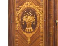 A Louis XVI Style Gilt-Bronze Mounted Mahogany and Marquetry Cabinet