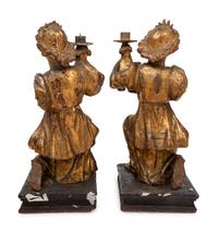 A Pair of Continental Giltwood Figural Altar Candlesticks