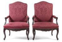 A Pair of Louis XV Style Carved Walnut Bergeres Height 41 1/2 inches. — 19TH CENTURY