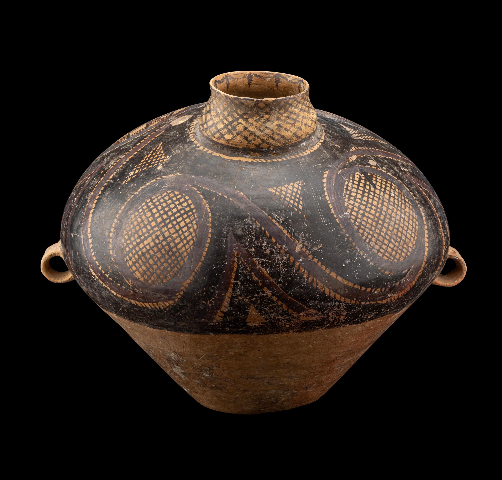 A Chinese Painted Pottery Handled Jar